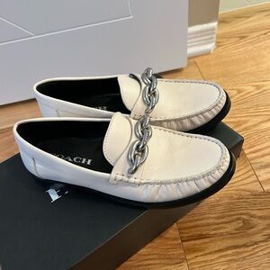 Brand new Coach leather shoes, with metal bucket